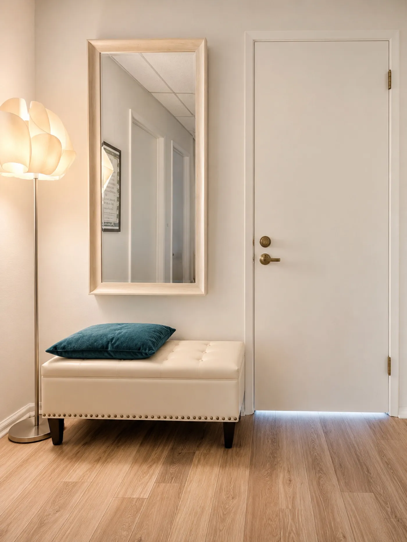 The entry at Uneka's studio — a mirror and bench where you're welcomed